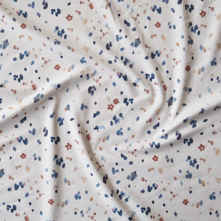 Pastel confetti organic cotton jersey stretch fabric for dressmaking