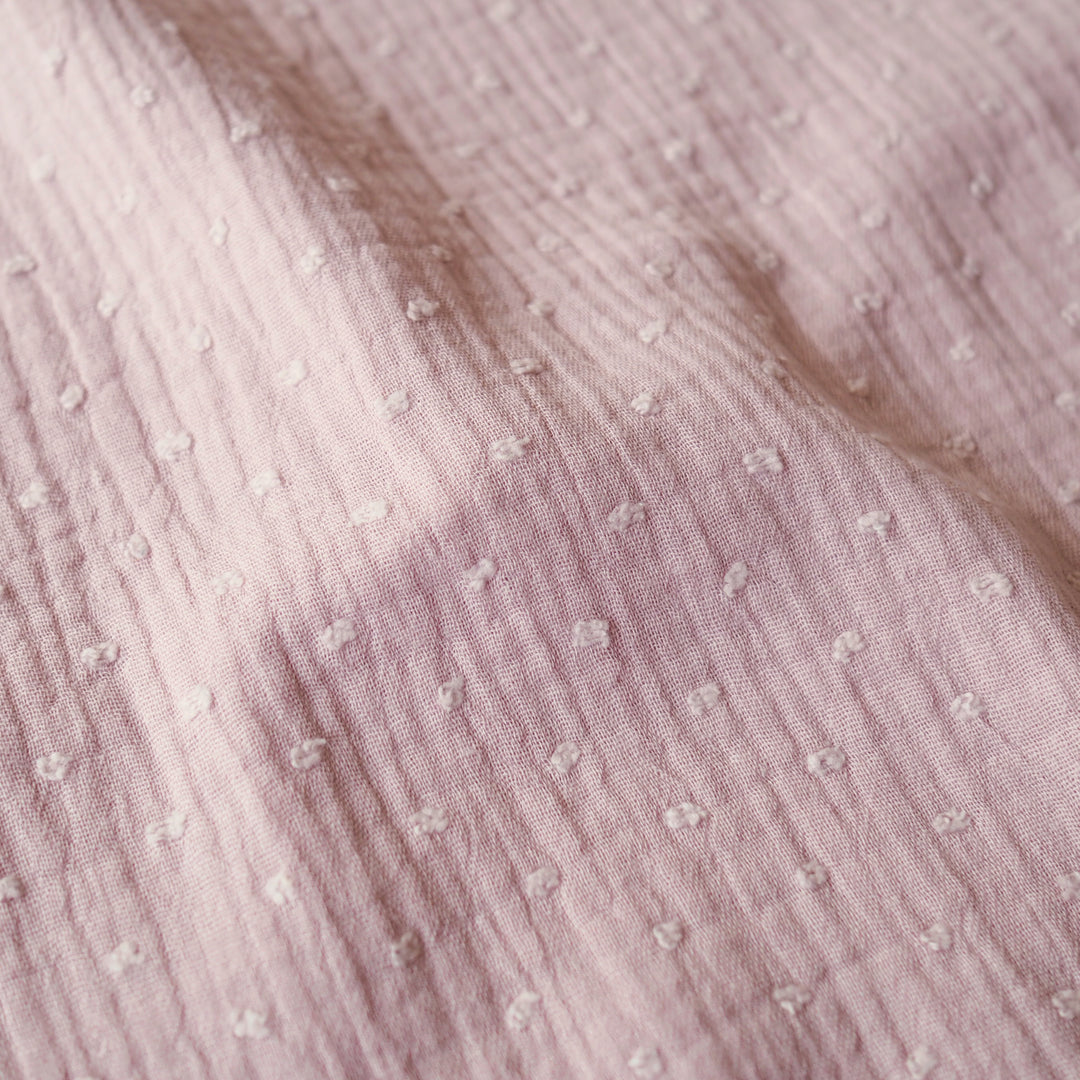 Rose pink dobby spot cotton double gauze dressmaking fabric