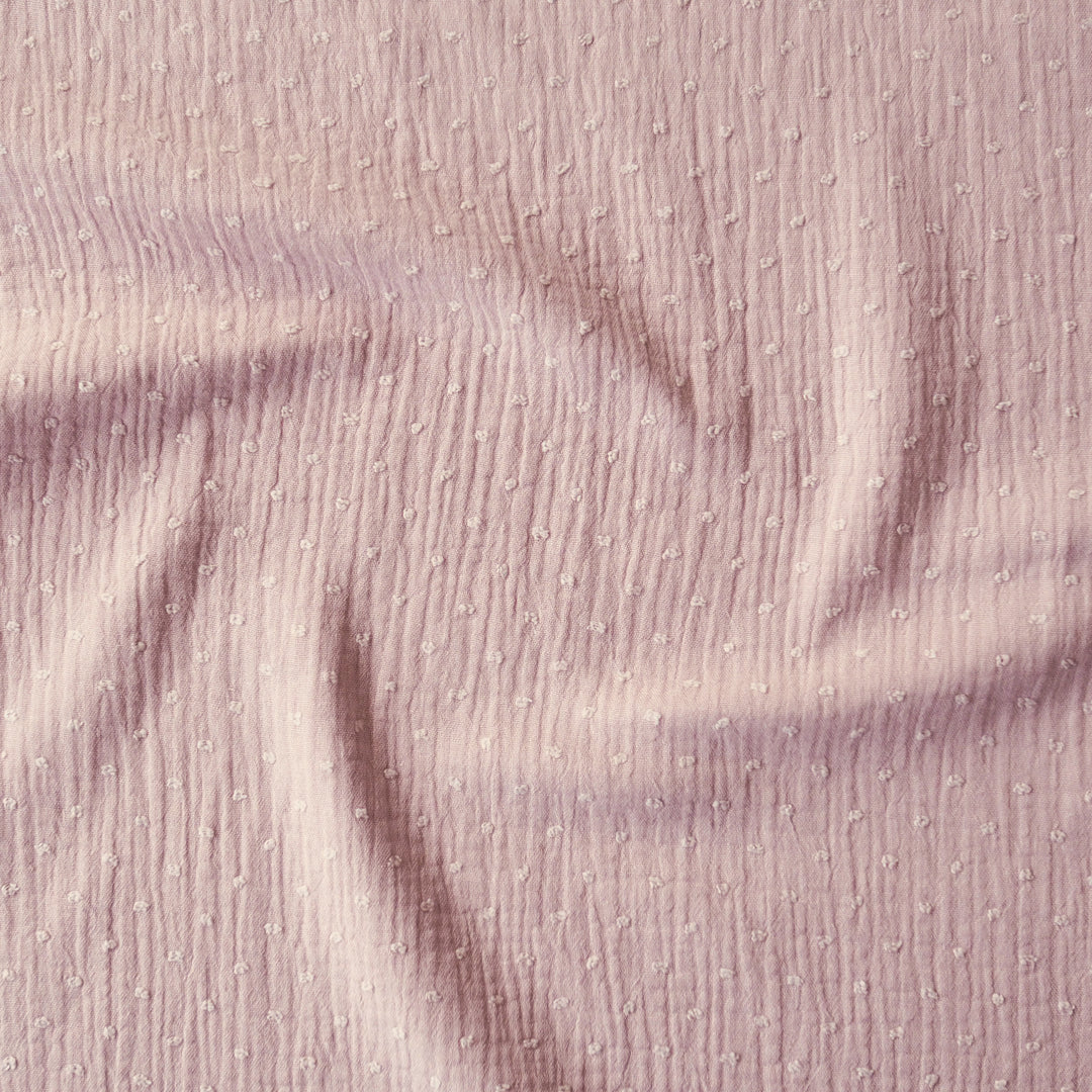 Rose pink dobby spot cotton double gauze dressmaking fabric