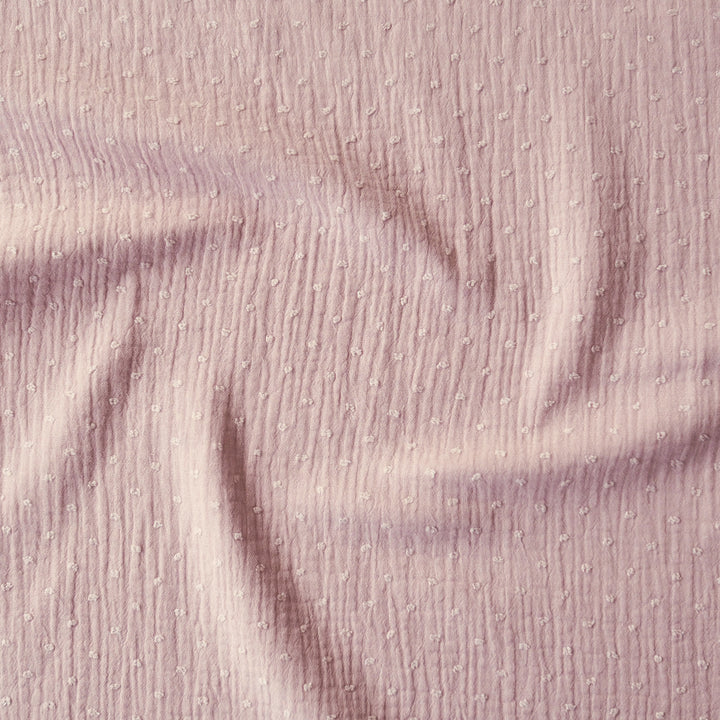 Rose pink dobby spot cotton double gauze dressmaking fabric