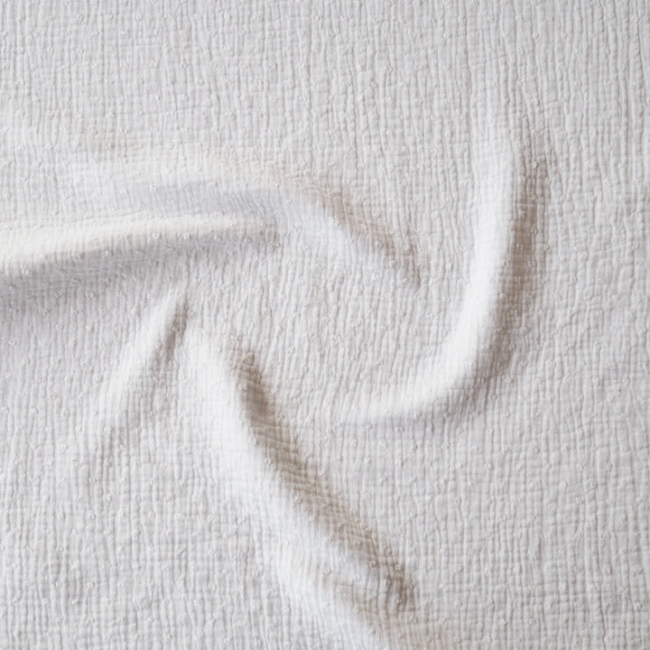 White dobby spot cotton double gauze dressmaking fabric