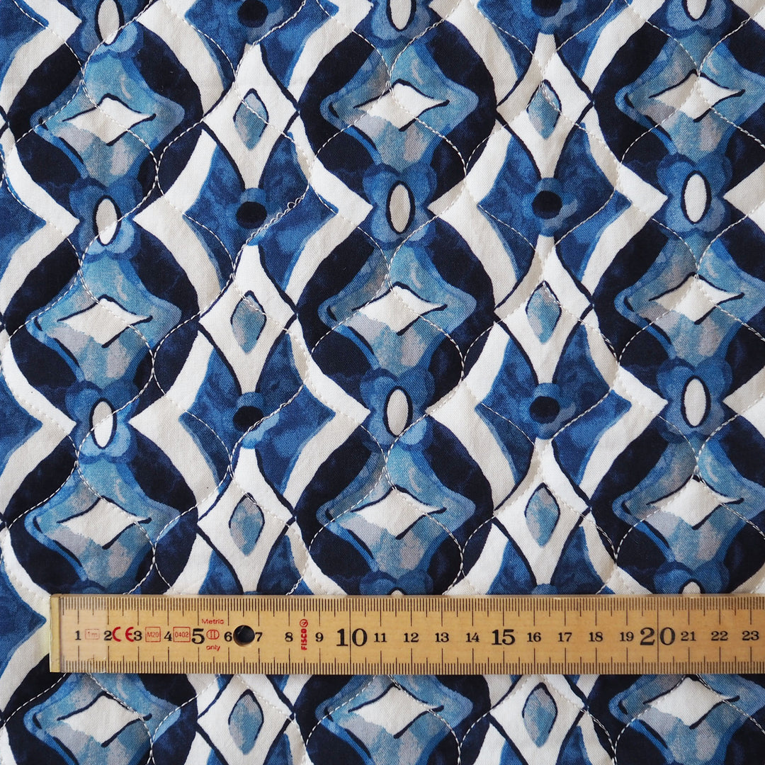 Inky Diamond Quilted Viscose Fabric for dressmaking