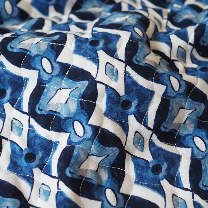 Inky Diamond Quilted Viscose Fabric for dressmaking