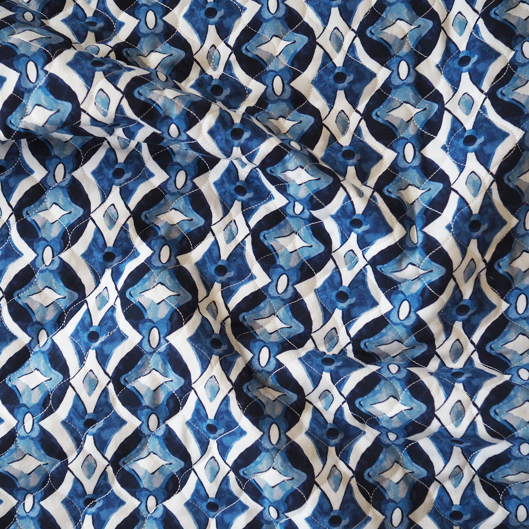 Inky Diamond Quilted Viscose Fabric for dressmaking