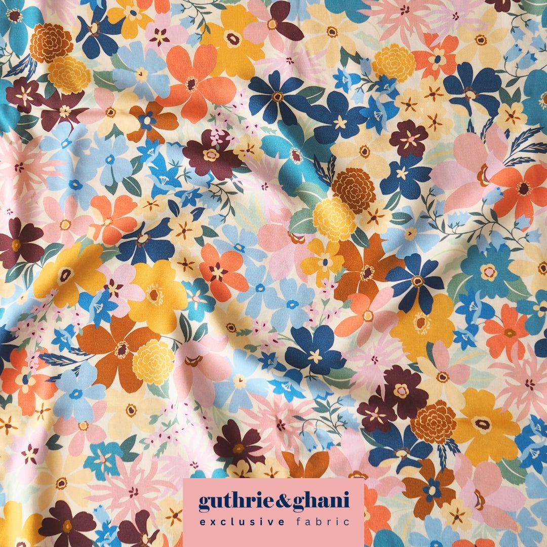 Colorful floral fabric with 'guthrie & ghani' branding.