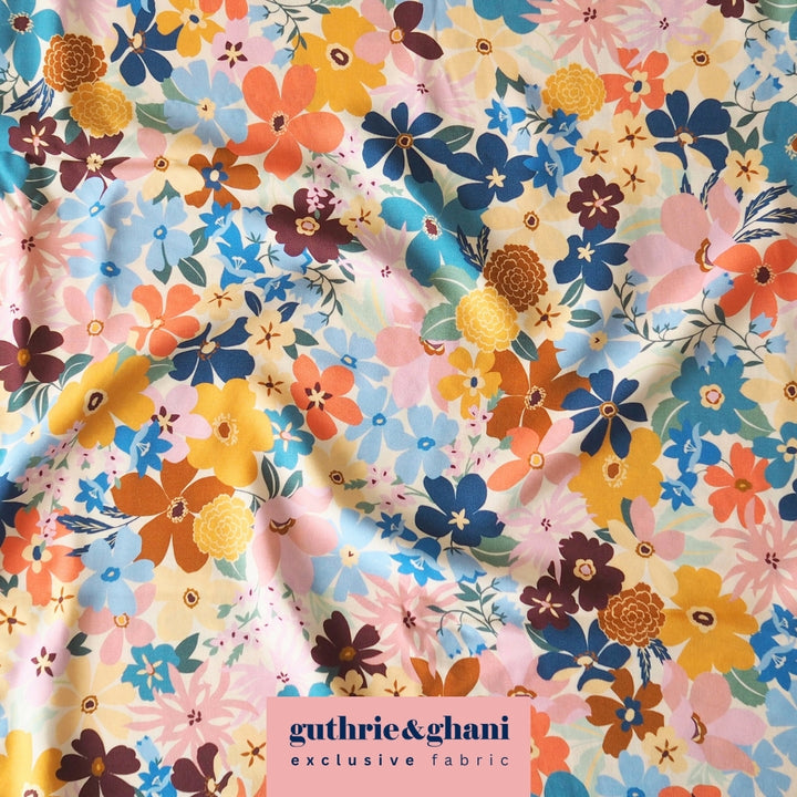 Colorful floral fabric with 'guthrie & ghani' branding.
