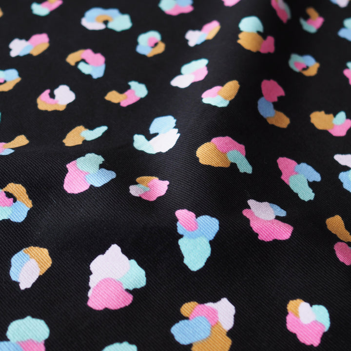 Black Cheetah Cotton Babycord Fabric for dressmaking
