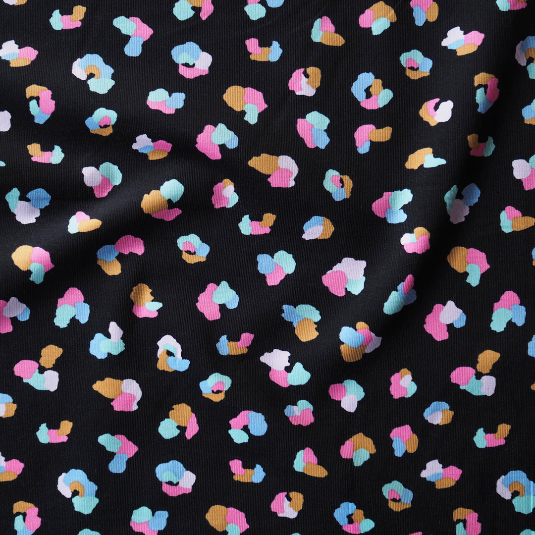 Black Cheetah Cotton Babycord Fabric for dressmaking