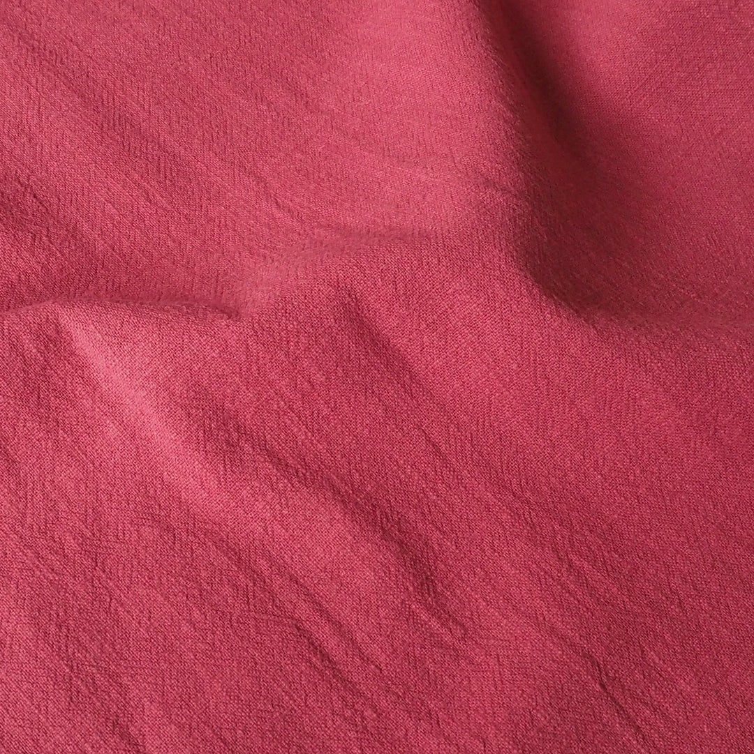 Close-up of pink fabric with texture
