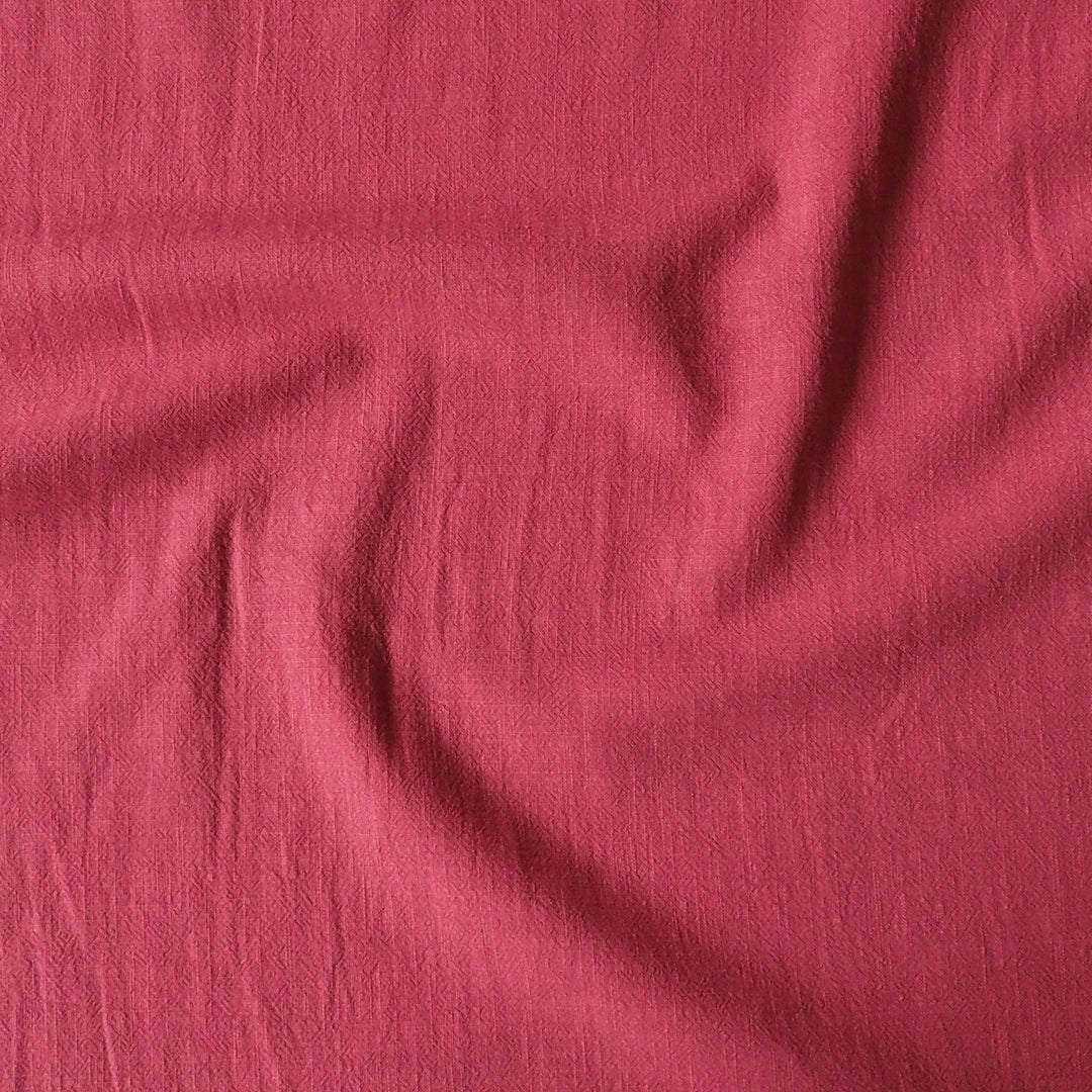 Close-up of pink fabric with visible texture