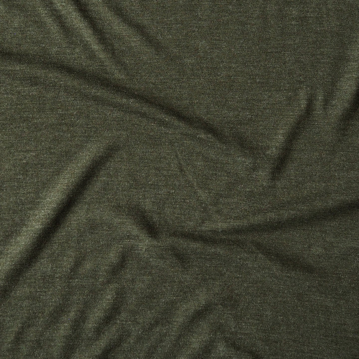 A close-up of dark olive green heathered fabric with soft folds and wrinkles.