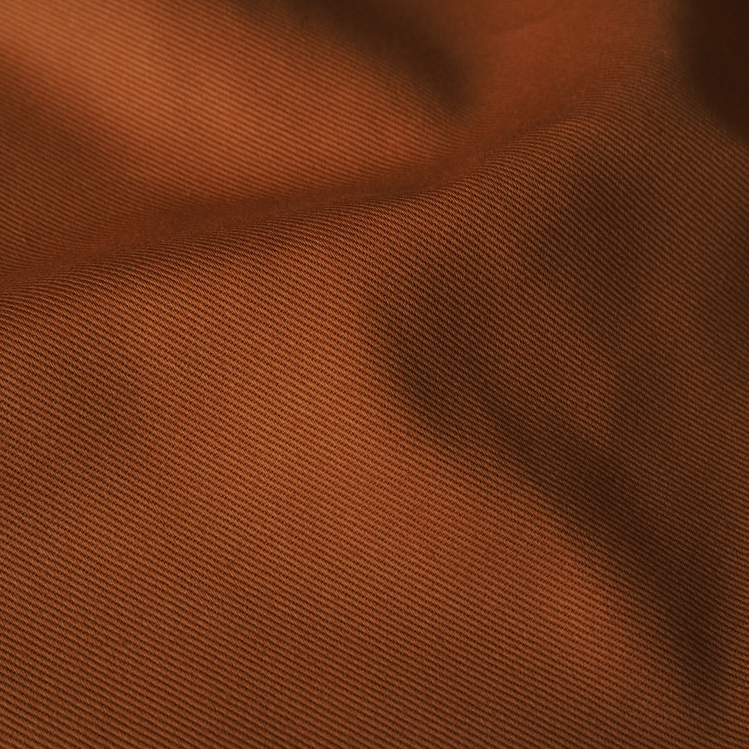 Sevenberry brick orange cotton twill drill fabric, perfect for dressmaking and other sewing projects.