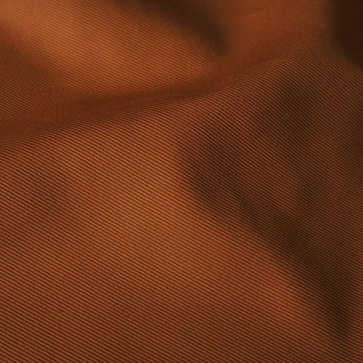 Sevenberry brick orange cotton twill drill fabric, perfect for dressmaking and other sewing projects.