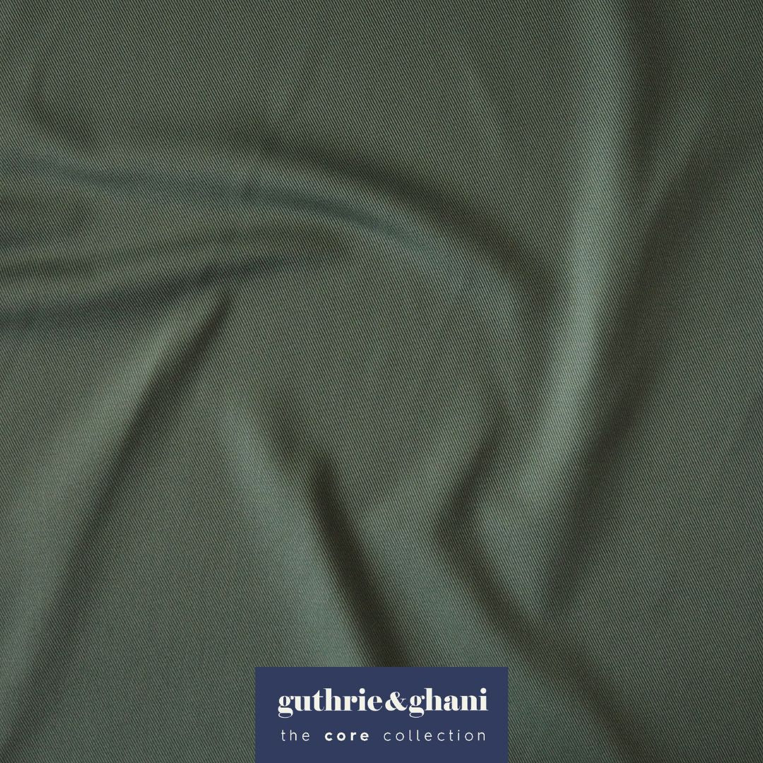 Sage green fabric with 'guthrie & ghani' label in the corner