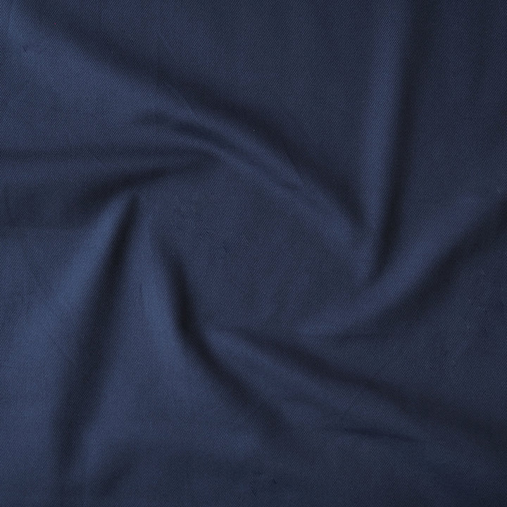 Sevenberry navy blue cotton twill drill fabric, perfect for dressmaking and other sewing projects.