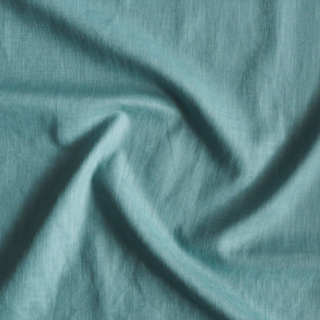 Washed Out Turquoise Soft Turquoise Washed Enzyme Linen Blend Fabric | Guthrie & Ghani