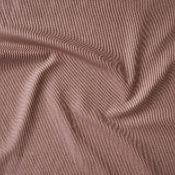 Sevenberry rose pink cotton twill drill fabric, perfect for dressmaking and other sewing projects.