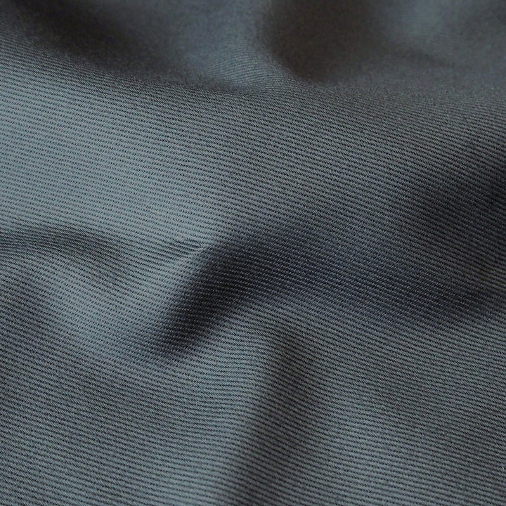 Sevenberry storm grey-blue cotton twill drill fabric, perfect for dressmaking and other sewing projects.