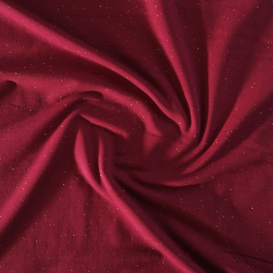 Berry fleeceback sweatshirt fabric with colourful flecks.