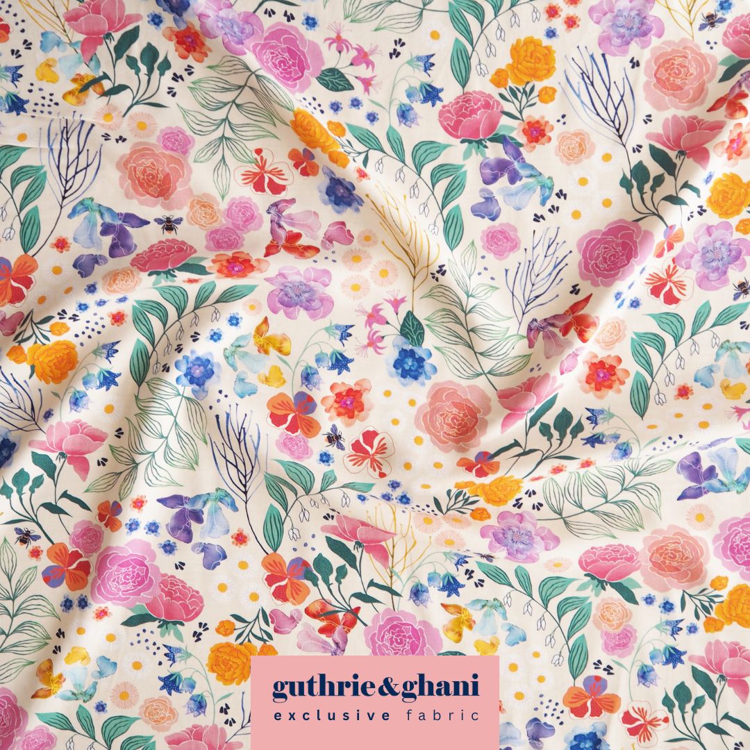 Cream Bee Happy Blooms Ecovero viscose fabric with floral and bee print, exclusive to Guthrie & Ghani.