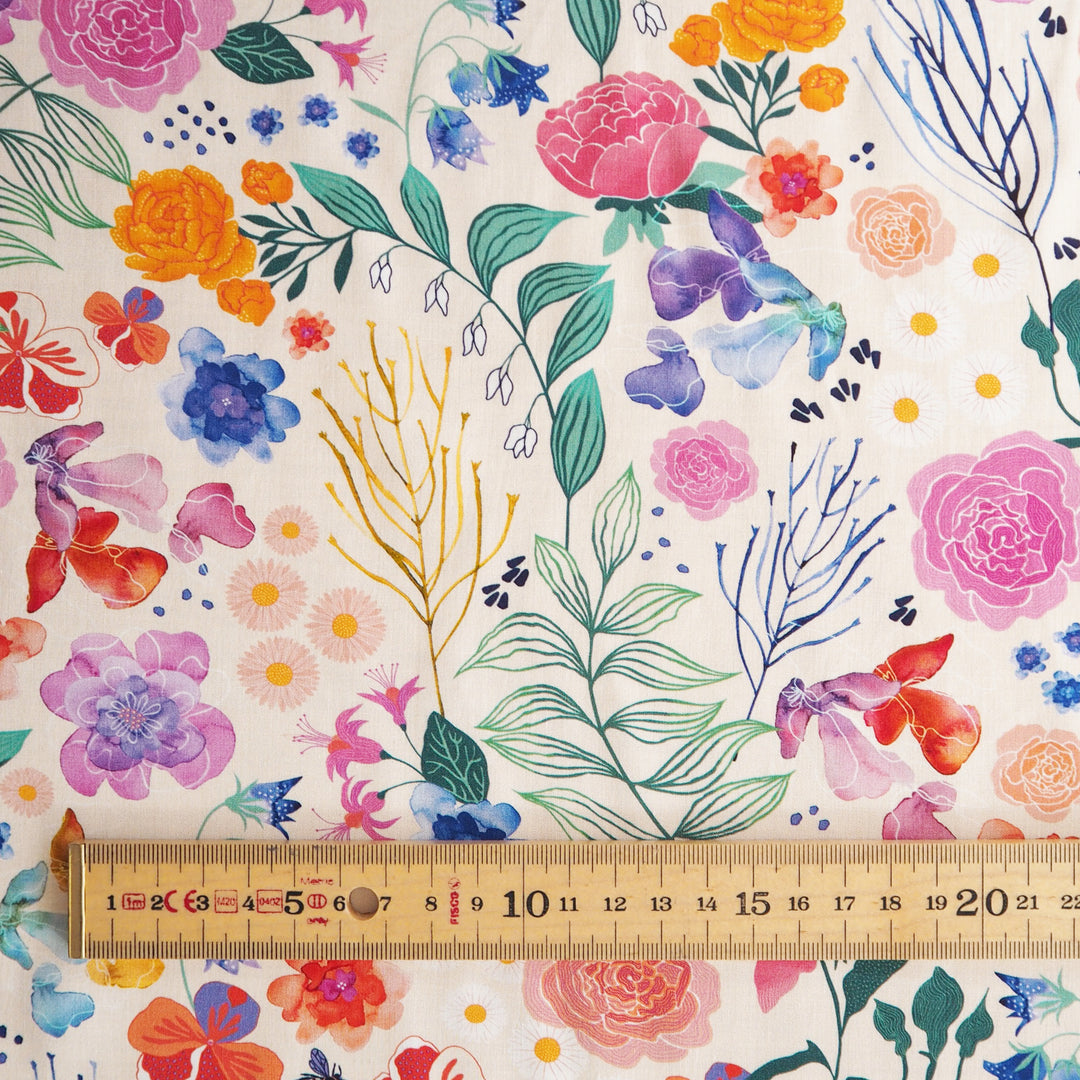 Cream Bee Happy Blooms Ecovero viscose fabric with floral and bee print, exclusive to Guthrie & Ghani.