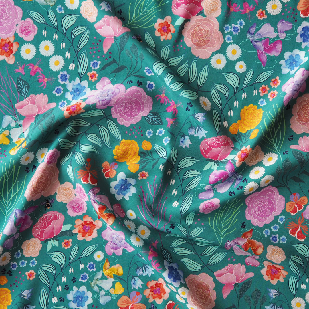 Teal Bee Happy Blooms Ecovero viscose fabric with floral and bee print, exclusive to Guthrie & Ghani.