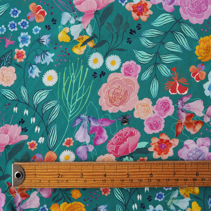 Teal Bee Happy Blooms Ecovero viscose fabric with floral and bee print, exclusive to Guthrie & Ghani.