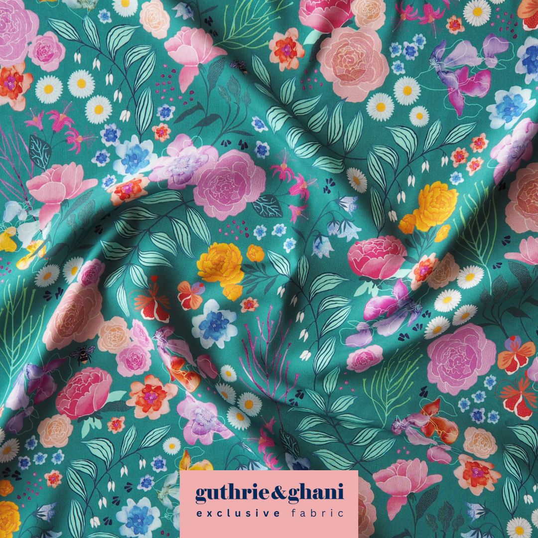Teal Bee Happy Blooms Ecovero viscose fabric with floral and bee print, exclusive to Guthrie & Ghani.