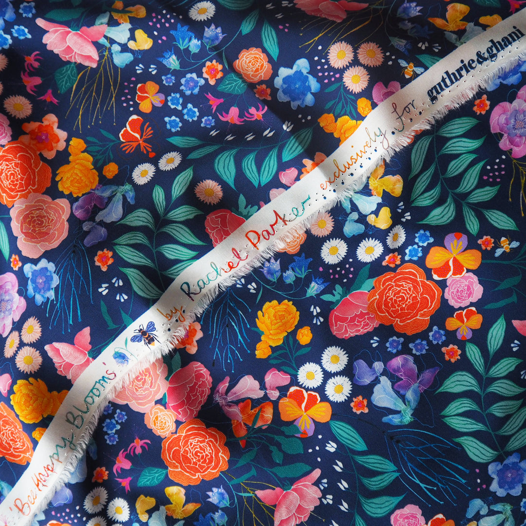Navy Bee Happy Blooms viscose poplin fabric with floral and bee print, designed by Rachel Parker for Guthrie & Ghani.