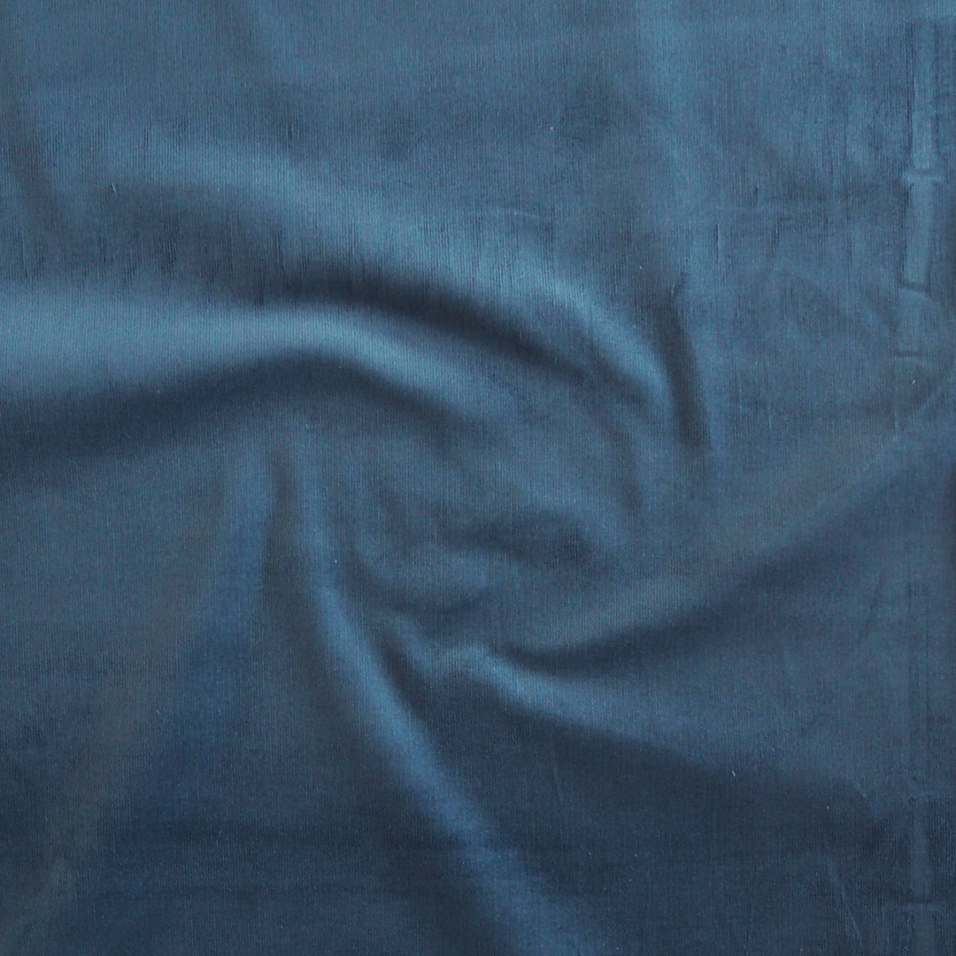 Pacific blue stretch cotton needlecord fabric, fine 21 wale cord.
