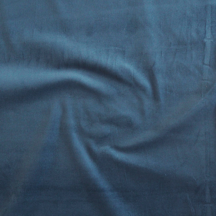 Pacific blue stretch cotton needlecord fabric, fine 21 wale cord.