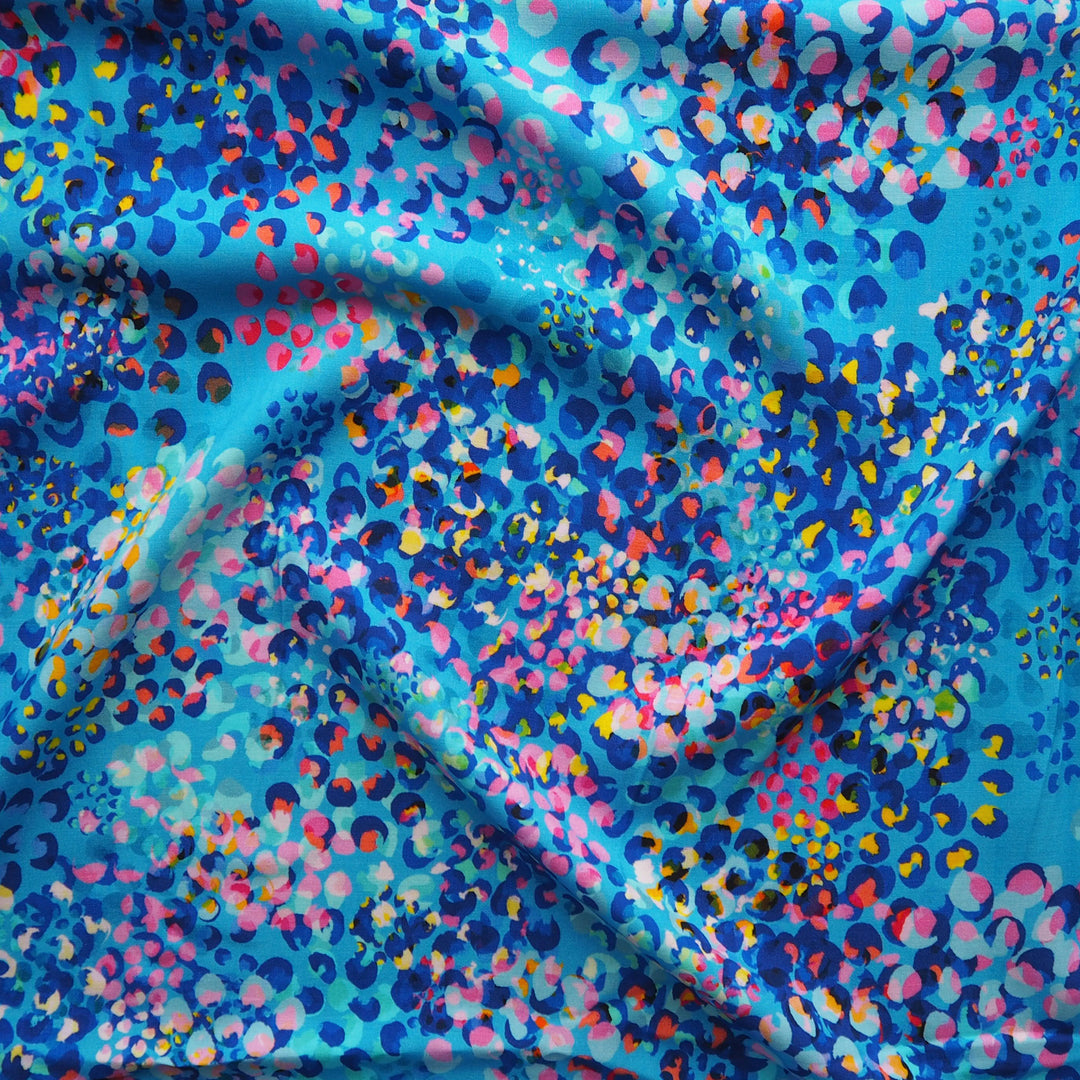 Sky Blue Chicacheetah viscose poplin fabric with an abstract cheetah print, designed by Rachel Parker for Guthrie & Ghani.