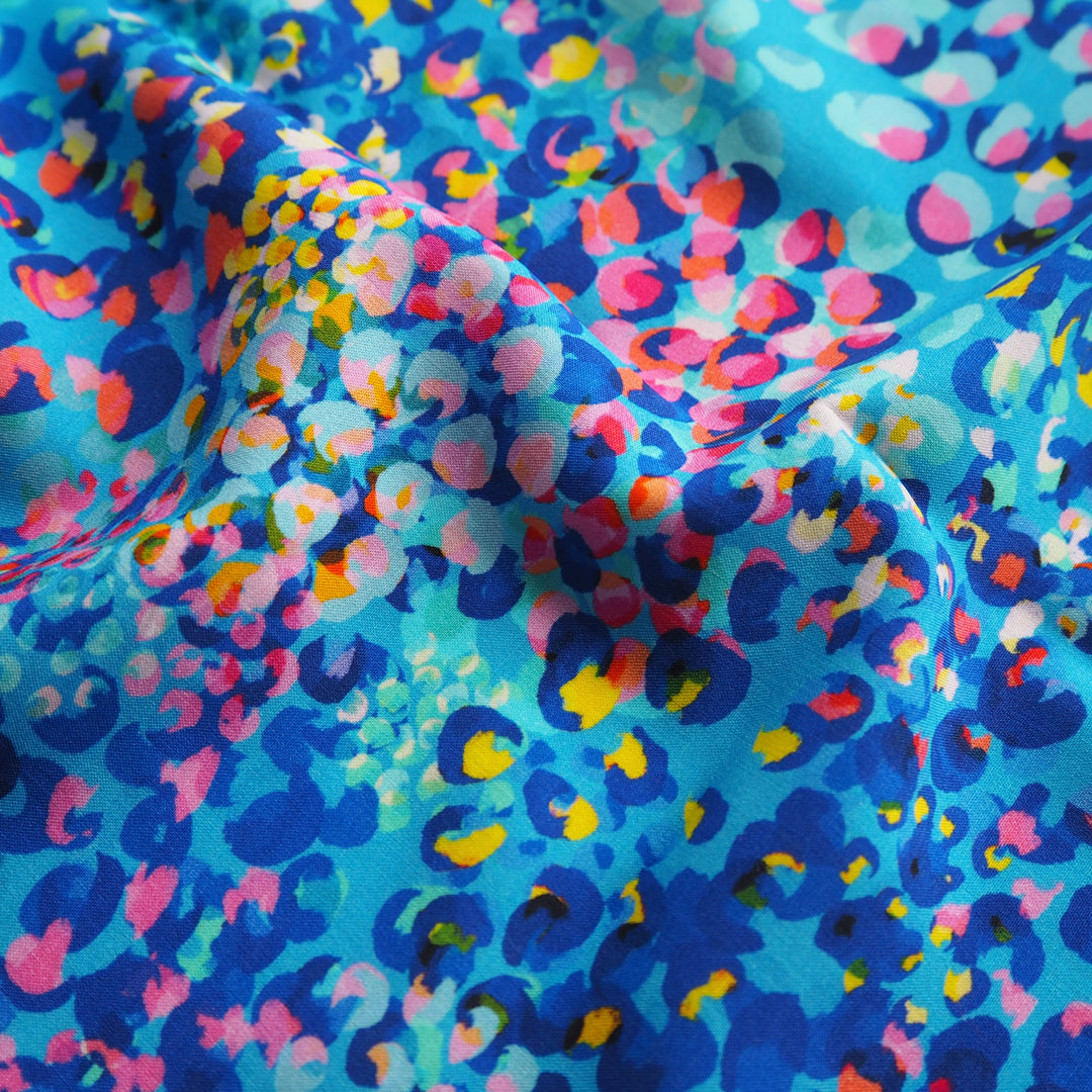 Sky Blue Chicacheetah viscose poplin fabric with an abstract cheetah print, designed by Rachel Parker for Guthrie & Ghani.