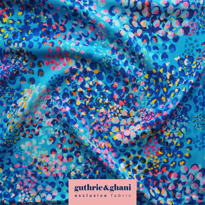 Sky Blue Chicacheetah viscose poplin fabric with an abstract cheetah print, designed by Rachel Parker for Guthrie & Ghani.