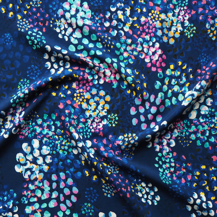 Navy Chicacheetah viscose poplin fabric with cheetah and foliage print, designed by Rachel Parker for Guthrie & Ghani.