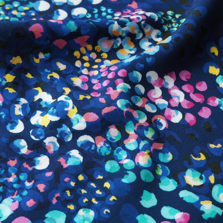 Navy Chicacheetah viscose poplin fabric with cheetah and foliage print, designed by Rachel Parker for Guthrie & Ghani.