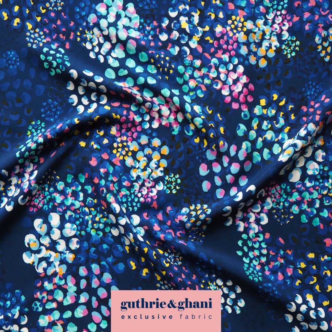 Navy Chicacheetah viscose poplin fabric with cheetah and foliage print, designed by Rachel Parker for Guthrie & Ghani.