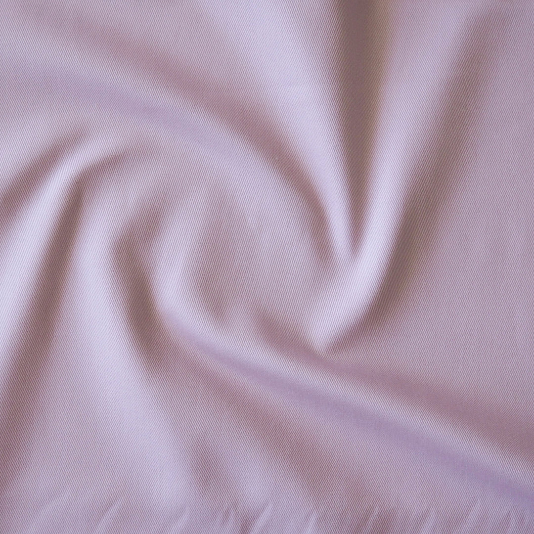 Sevenberry lilac purple cotton twill fabric, showing the texture of the dressmaking fabric