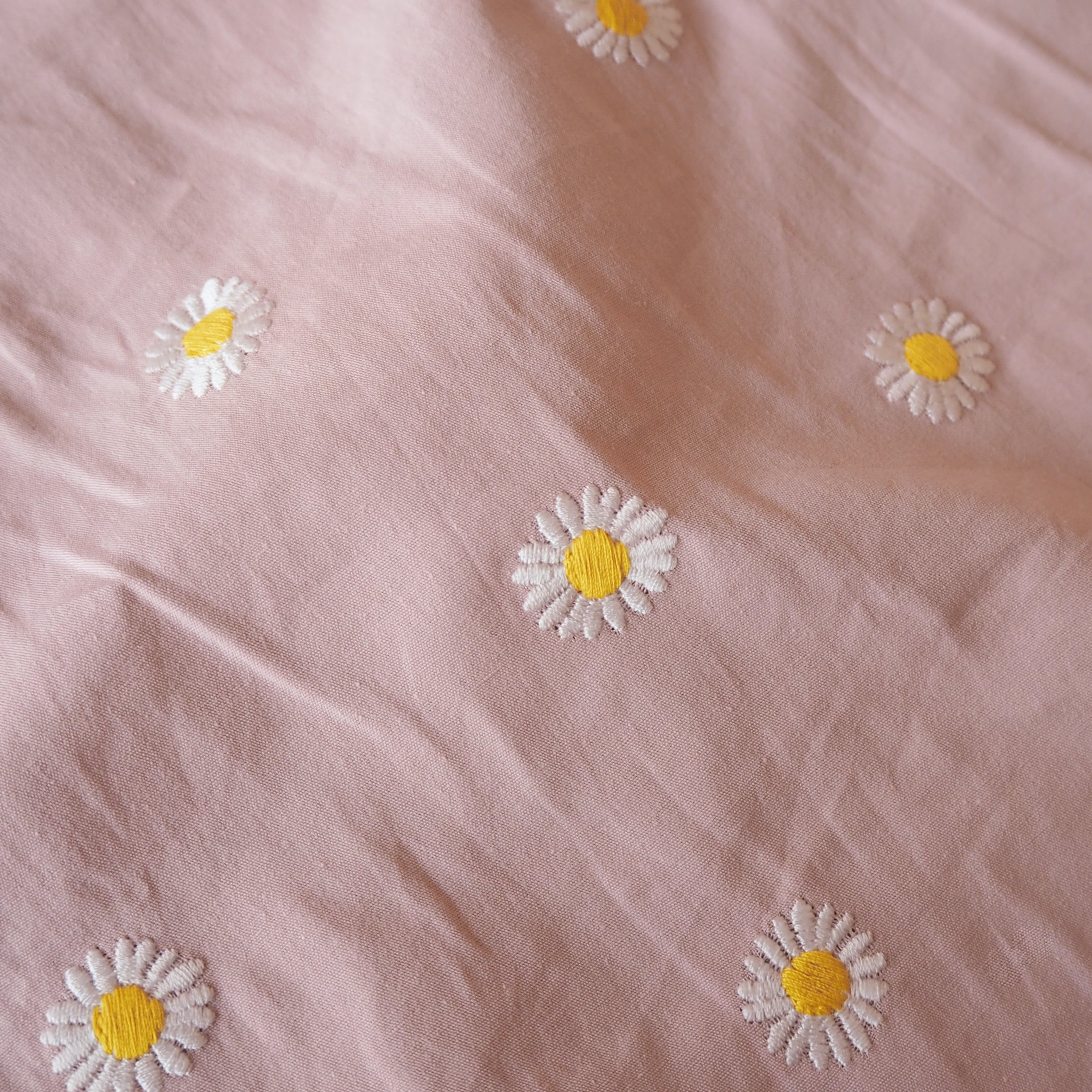 Mari：Poplin Daisy Cutwork Pink Daisy Embroidered Cotton Poplin Fabric – Guthrie & Ghani