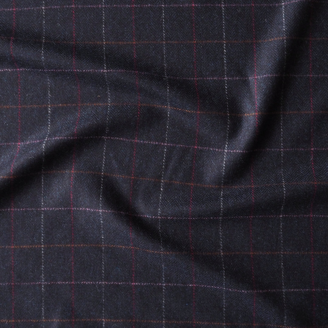 Dark blue british wool fabric with a subtle check pattern