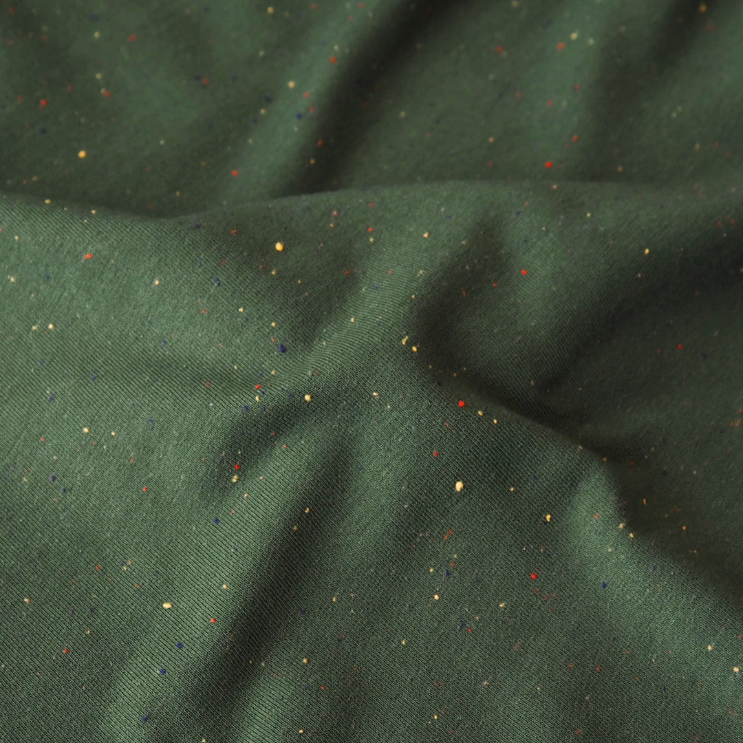 Forest green fleeceback sweatshirt fabric with colourful flecks.