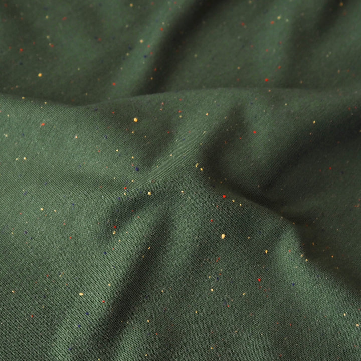 Forest green fleeceback sweatshirt fabric with colourful flecks.
