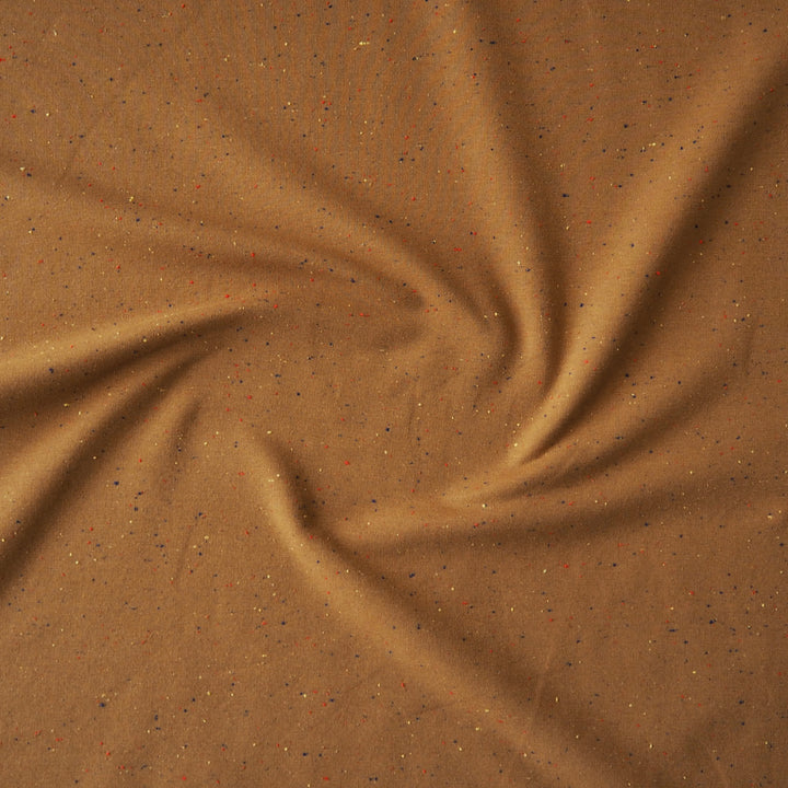 Amber fleeceback sweatshirt fabric with colourful flecks.