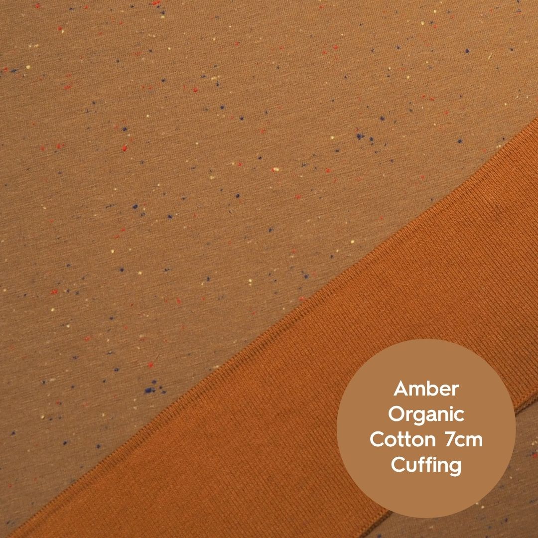 Amber fleeceback sweatshirt fabric with colourful flecks.