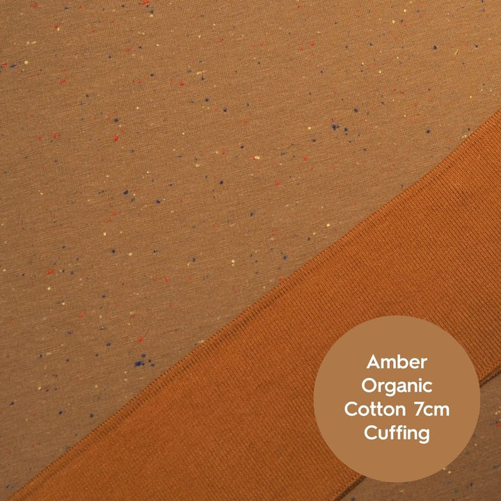 Amber fleeceback sweatshirt fabric with colourful flecks.