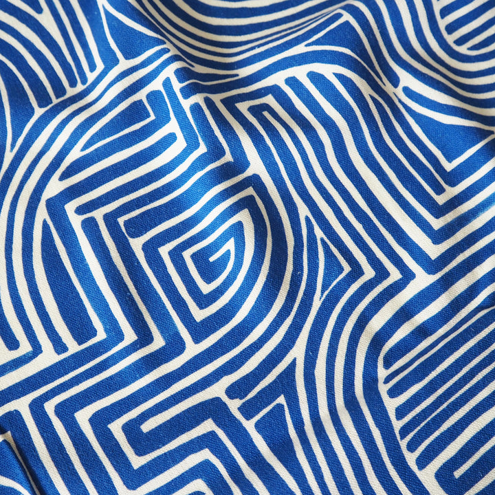 Close-up of blue and white geometric patterned fabric