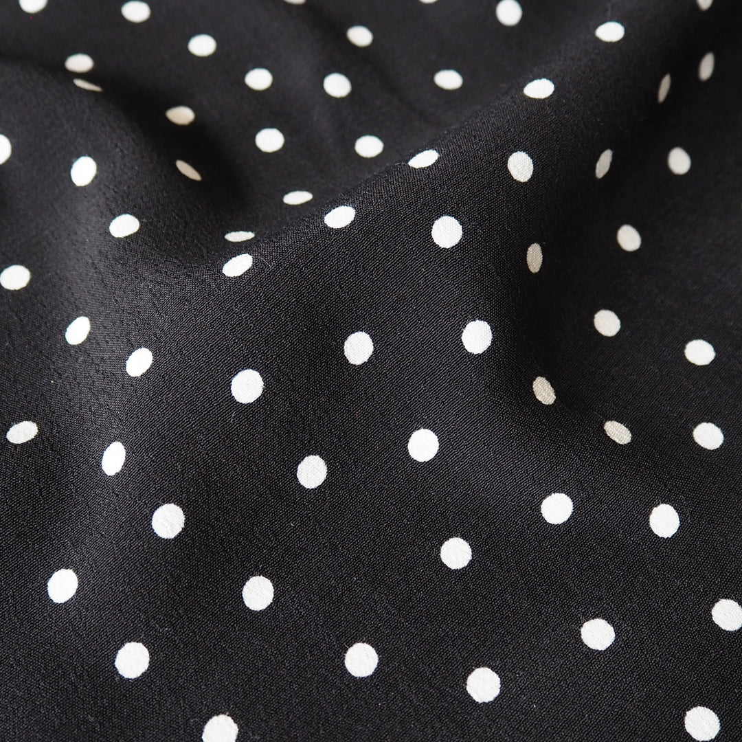 Fabric Godmother Black Vivian Polka Dot Viscose Crepe Fabric – black viscose crepe with ivory polka dots