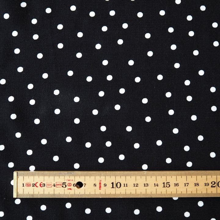 Fabric Godmother Black Vivian Polka Dot Viscose Crepe Fabric – black viscose crepe with ivory polka dots