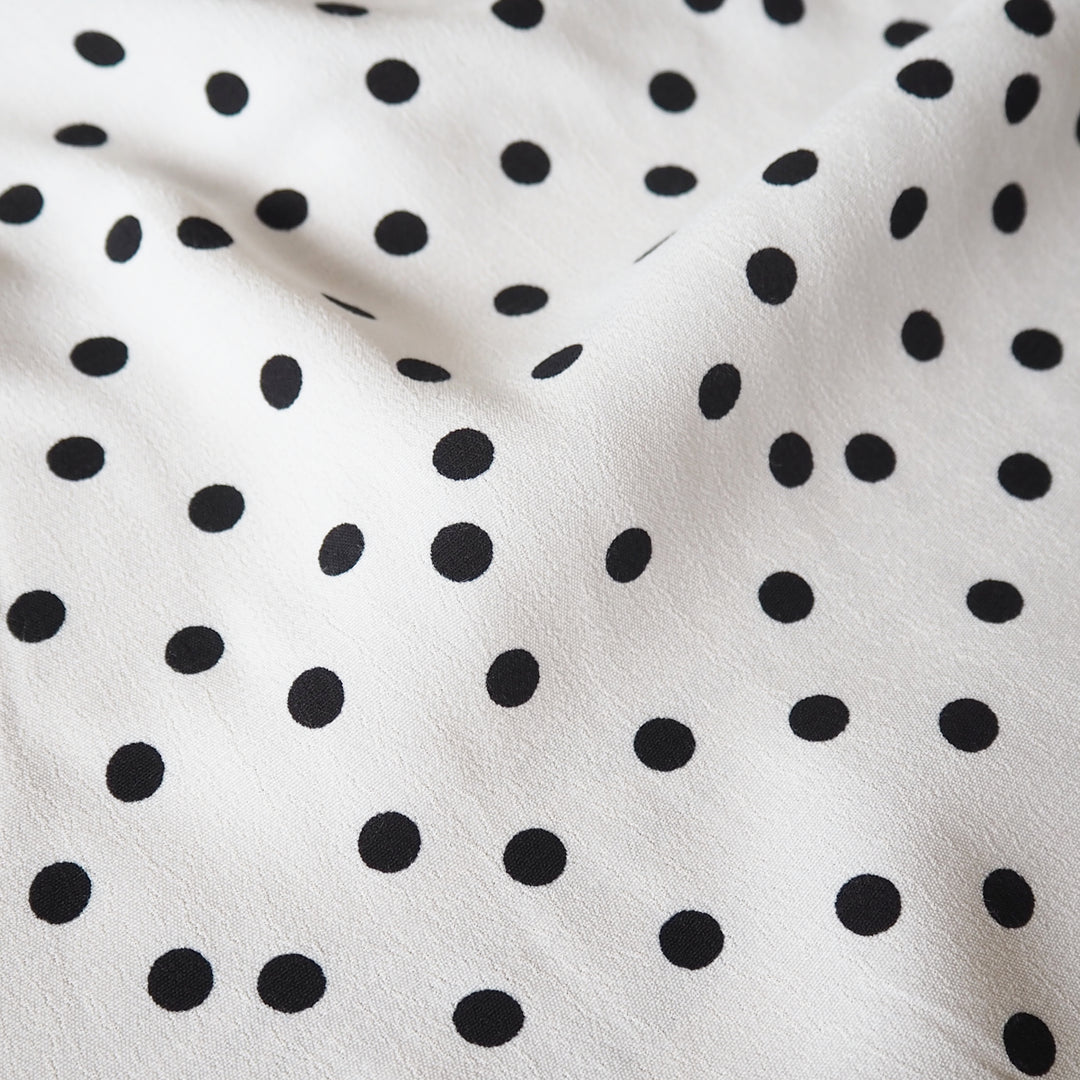 Fabric Godmother Ivory Vivian Polka Dot Viscose Crepe Fabric – ivory viscose crepe with black polka dots