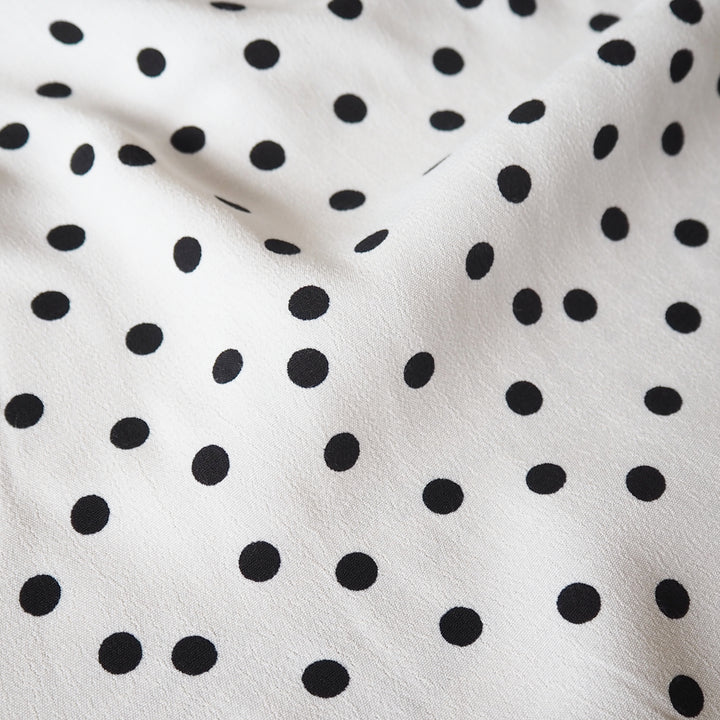 Fabric Godmother Ivory Vivian Polka Dot Viscose Crepe Fabric – ivory viscose crepe with black polka dots